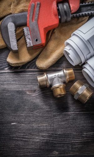 Pipe,Wrench,Copper,Plumbing,Fixtures,Safety,Gloves,Blueprint,Rolls.
